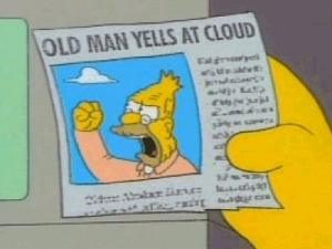 Grandpa Simpson from the Simpsons cartoon shaking his fist at a cloud, his picture is in a newspaper, a yellow hand holds the newspaper