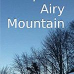 book cover for Up the Airy Mountain by Debra Doyle and James Macdonald, is a snowy woods scene with the title in white lettering on the blue sky and the authors' names in black lettering on the snow