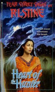 cover of Heart of the Hunter by R L Stine shows an Indian woman being stalked by a shadowy figure in the fog, with the head of a wolf in the clouds, under a full moon